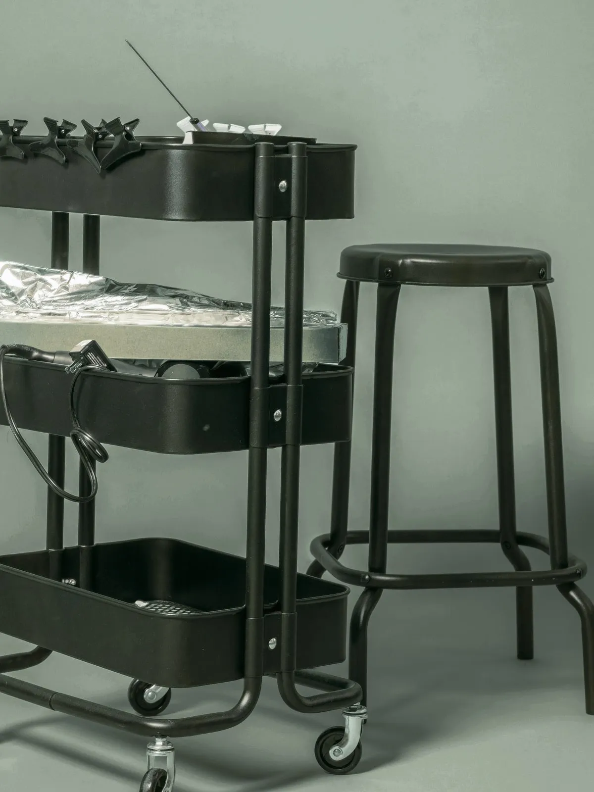 Silk press tools (flat iron, brushes, clips) at the Montreal studio